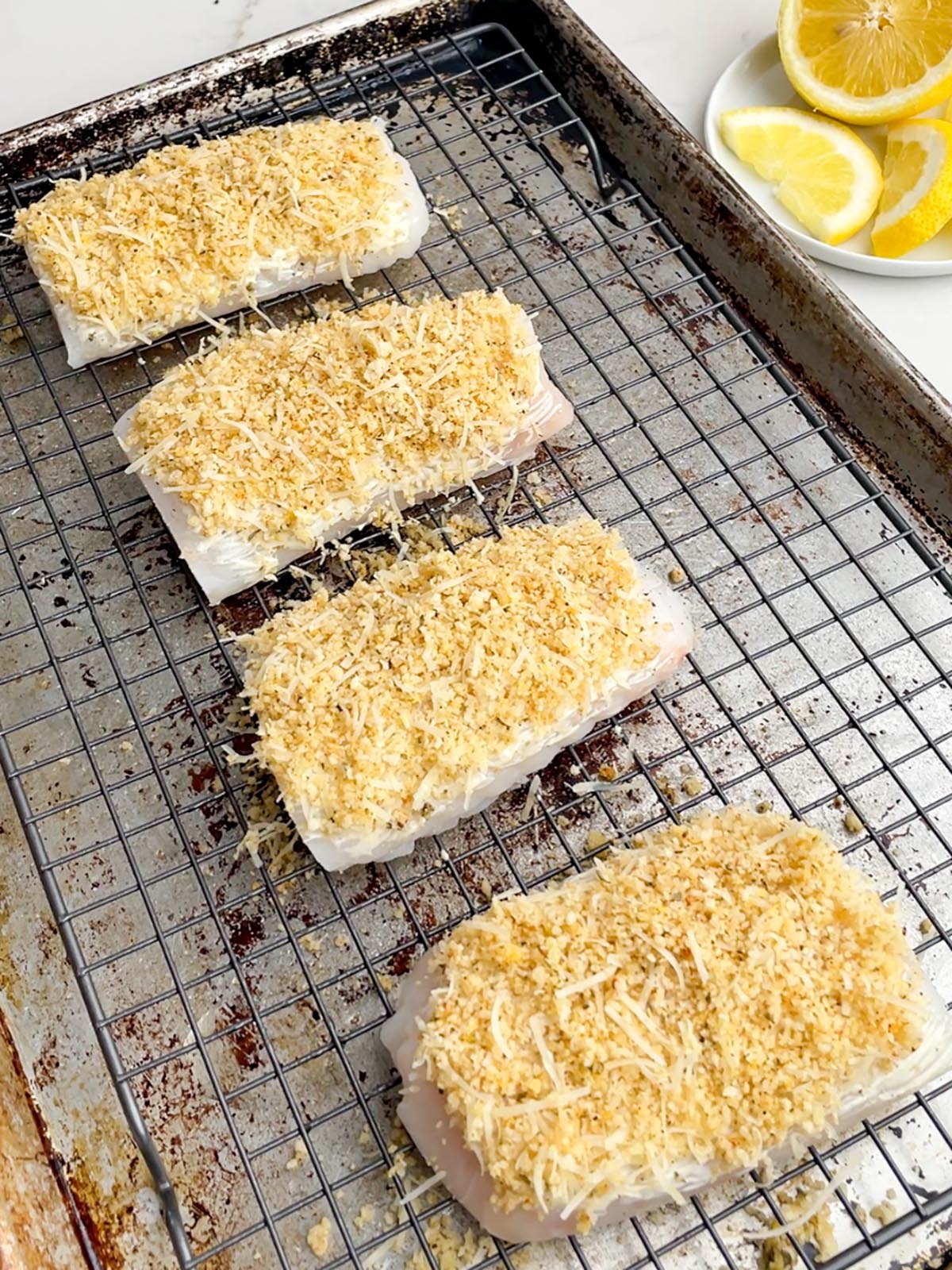 cod with parmesan panko on a wire baking rack