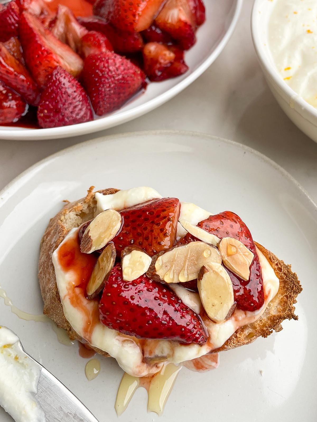 balsamic roasted strawberries, whipped ricotta and toasted almonds on toasted bread