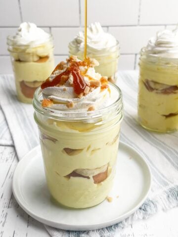 caramel drizzling into a banana pudding cup.