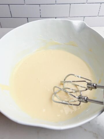 cream cheese and condensed milk mixture in white bowl.