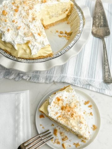 slice of banana pudding pie on white plate.
