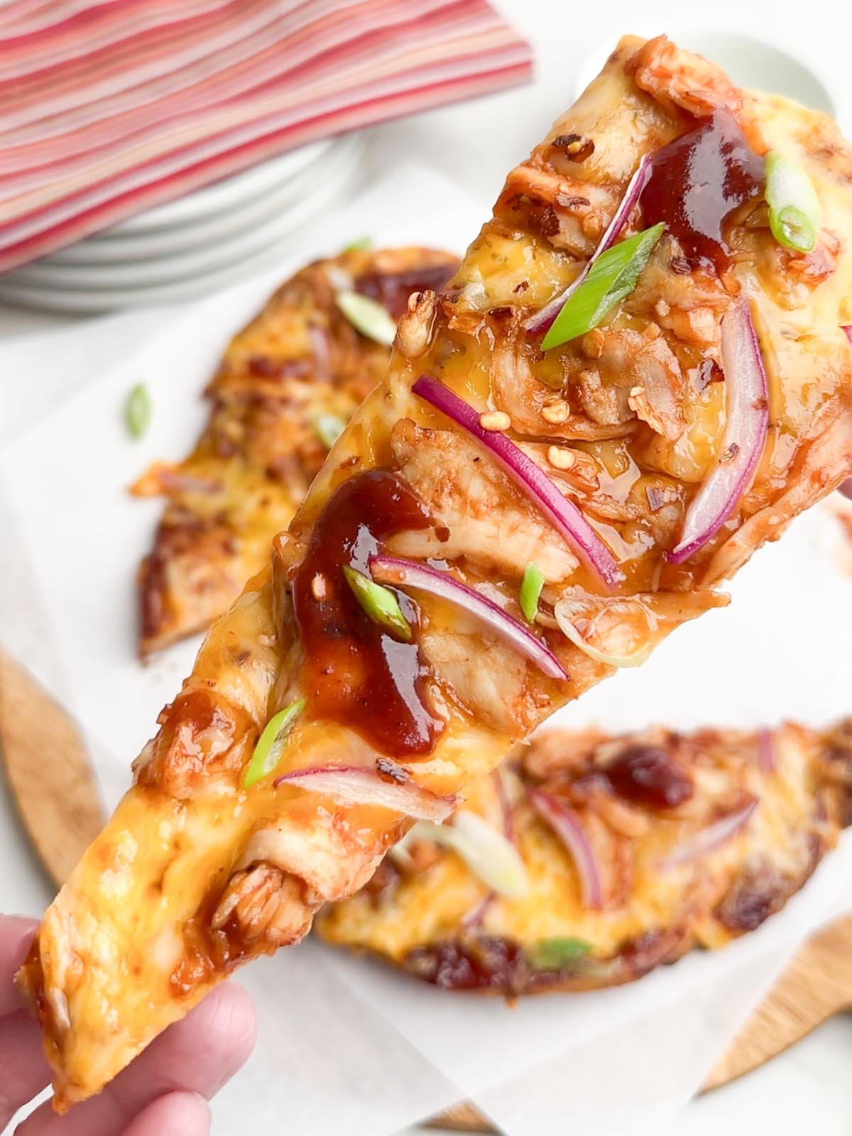 close up of a piece of BBQ chicken flatbread