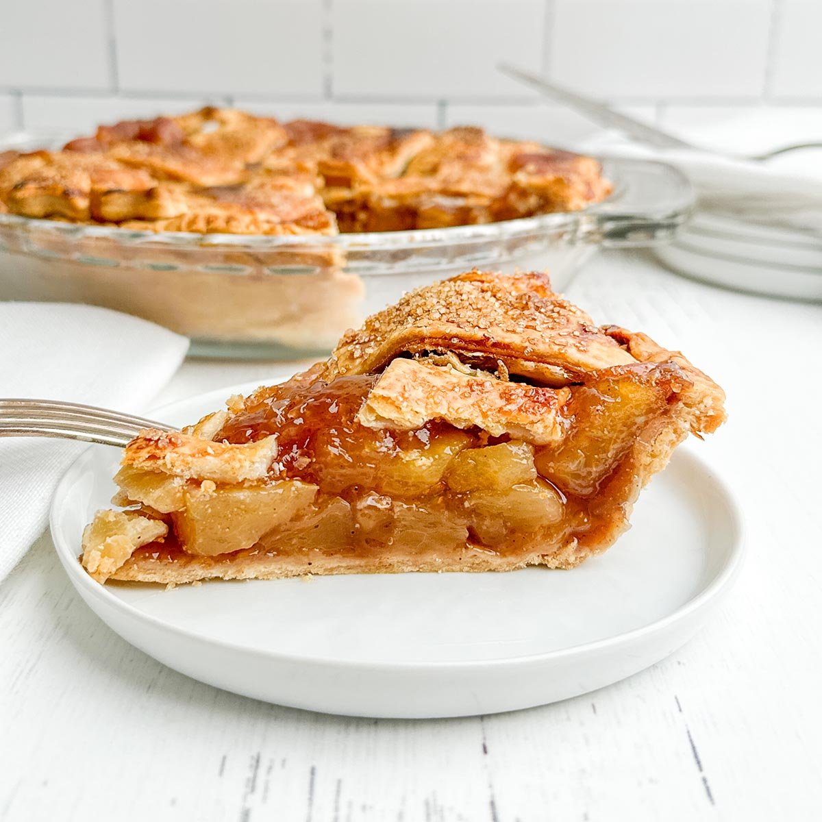 Side view of a piece of apple pie.