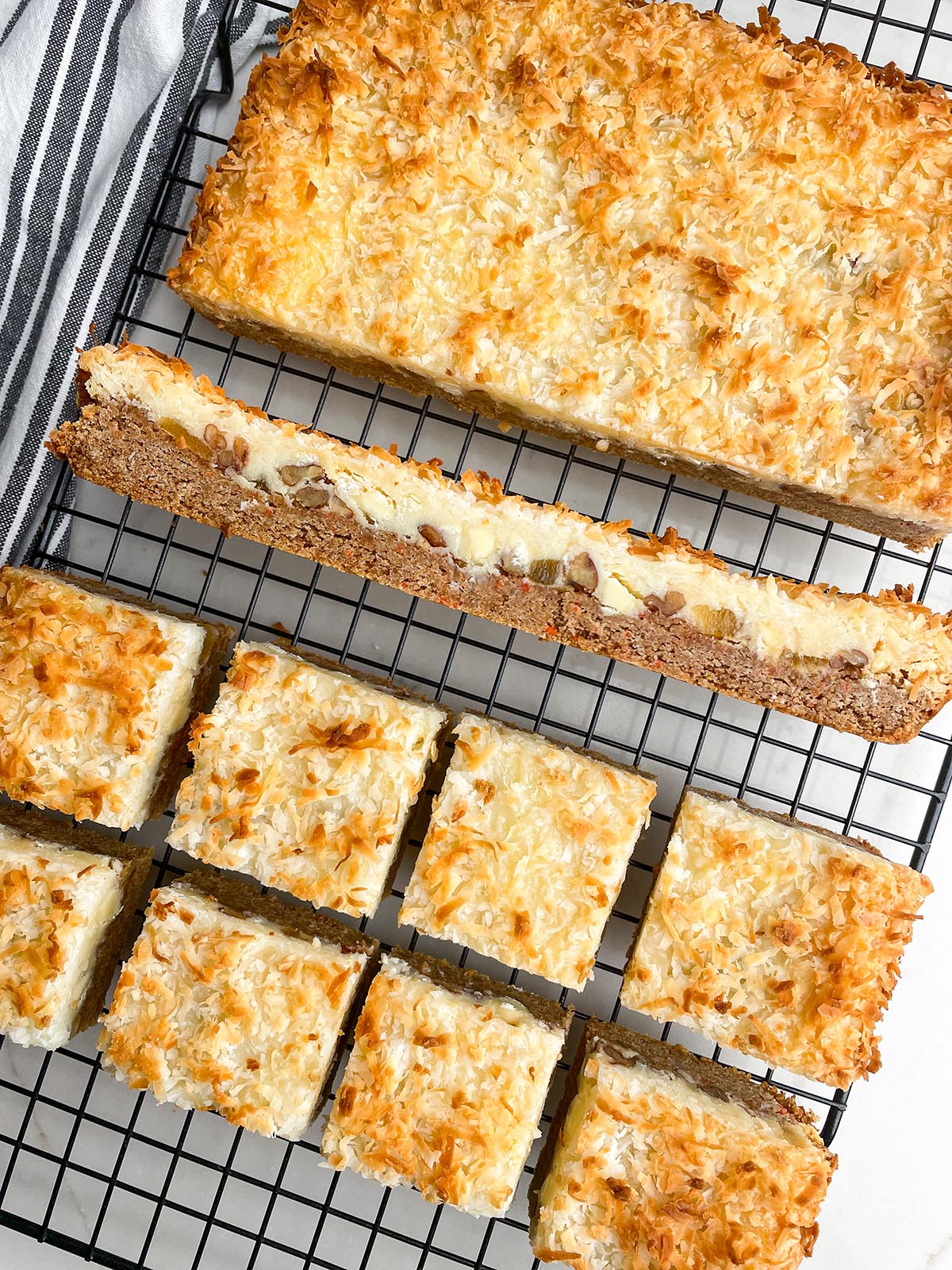 carrot cake mix bars on a wire baking rack.