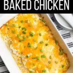 baked chicken with cheese on top in white casserole dish