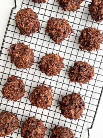 baked double chocolate chip macaroons a wire baking rack. 