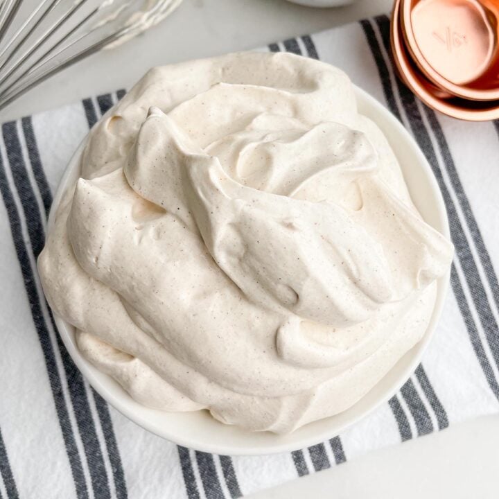 cinnamon whipped cream in a white bowl