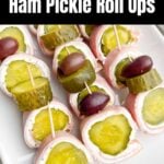 white platter with ham and pickle roll ups