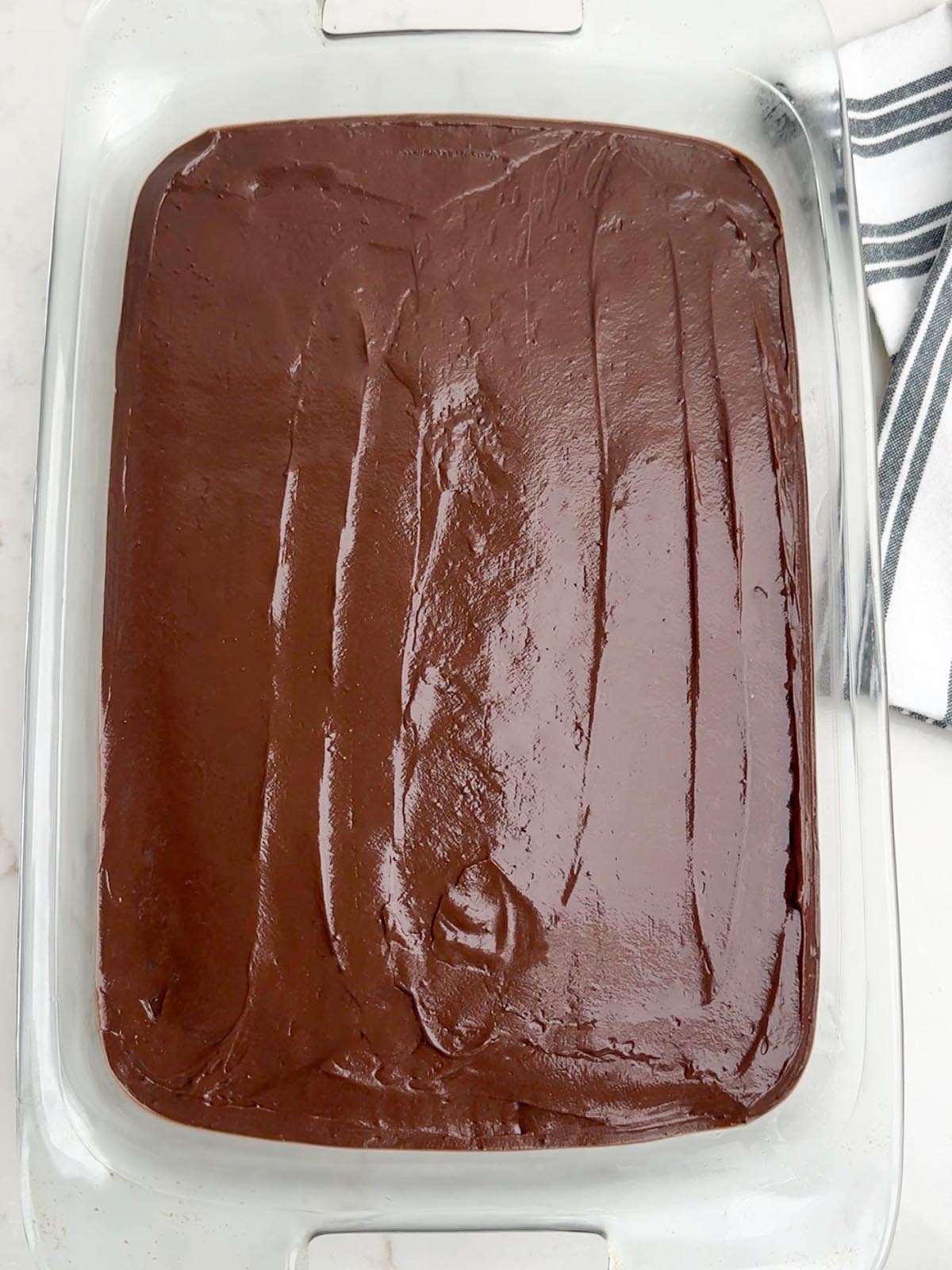 chocolate pudding layer smoothed on top of dessert
