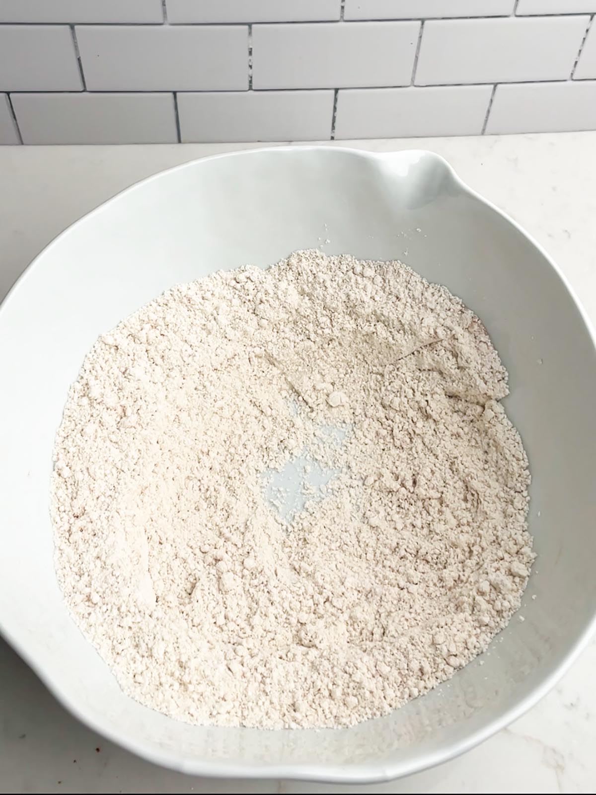 dry ingredients in a white mixing bowl.