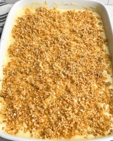 macaroni and cheese with breadcrumbs in a  baking dish. 