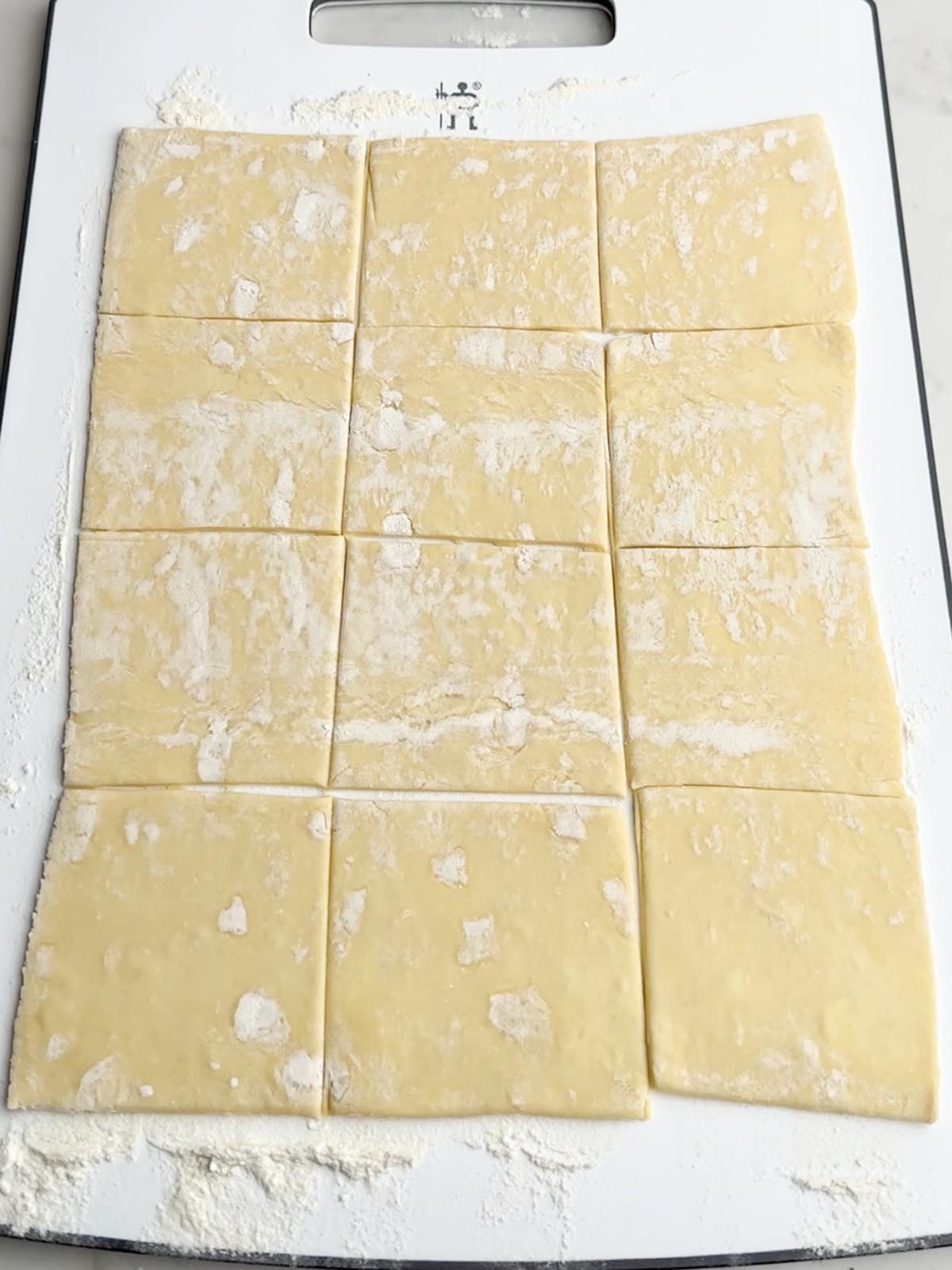 puff pastry sheet cut into 12 squares