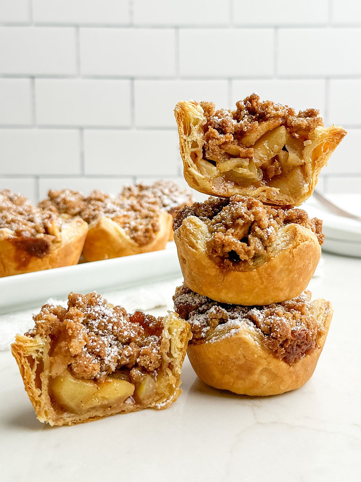 stack of mini puff pastry apple pies