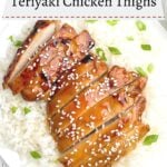 sliced oven baked teriyaki chicken with green onions and sesame seeds on a bed of rice