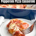 pizza casserole on a white plate in front of a casserole dish.