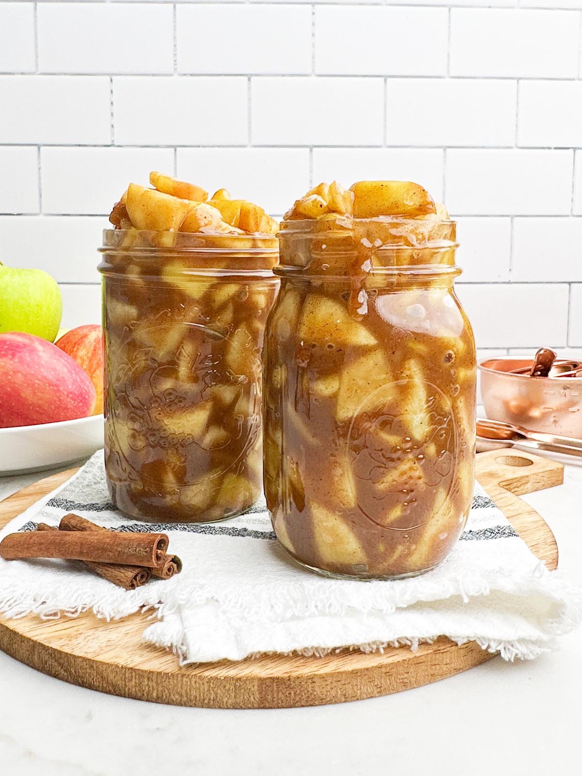 mason jars filled with pre cooked apple pie filling