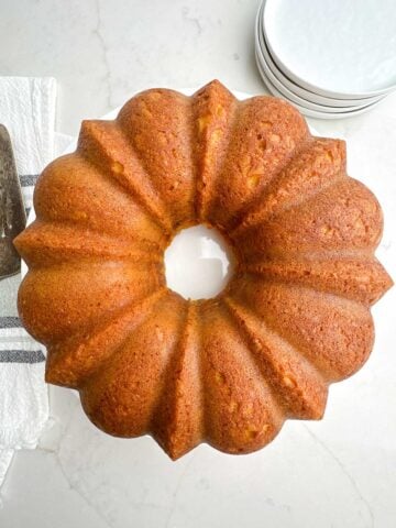 pumpkin cake with yellow cake mix on a white plate.