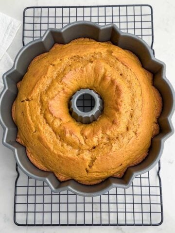 baked pumpkin cake with yellow cake mix in a Bundt pan.