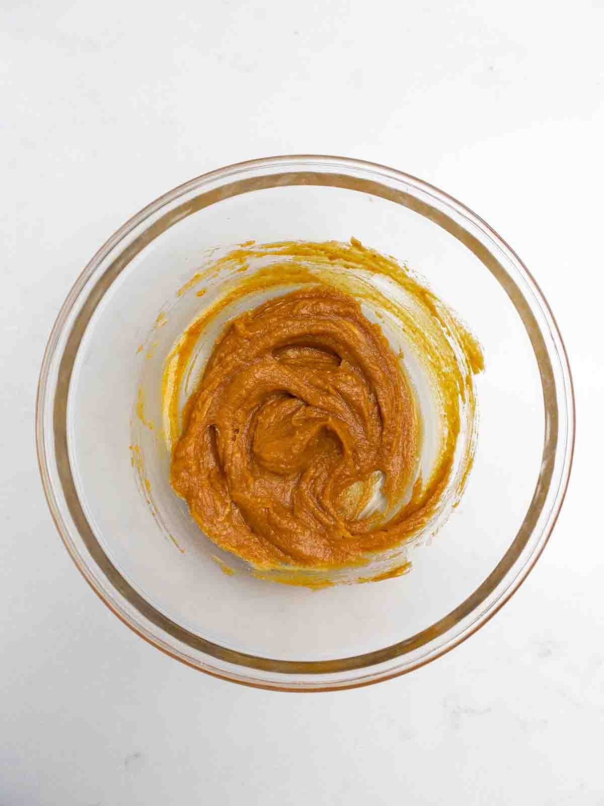 pumpkin peanut butter chip mixture in a clear bowl