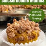 pumpkin snickerdoodle muffins in a white muffin liner