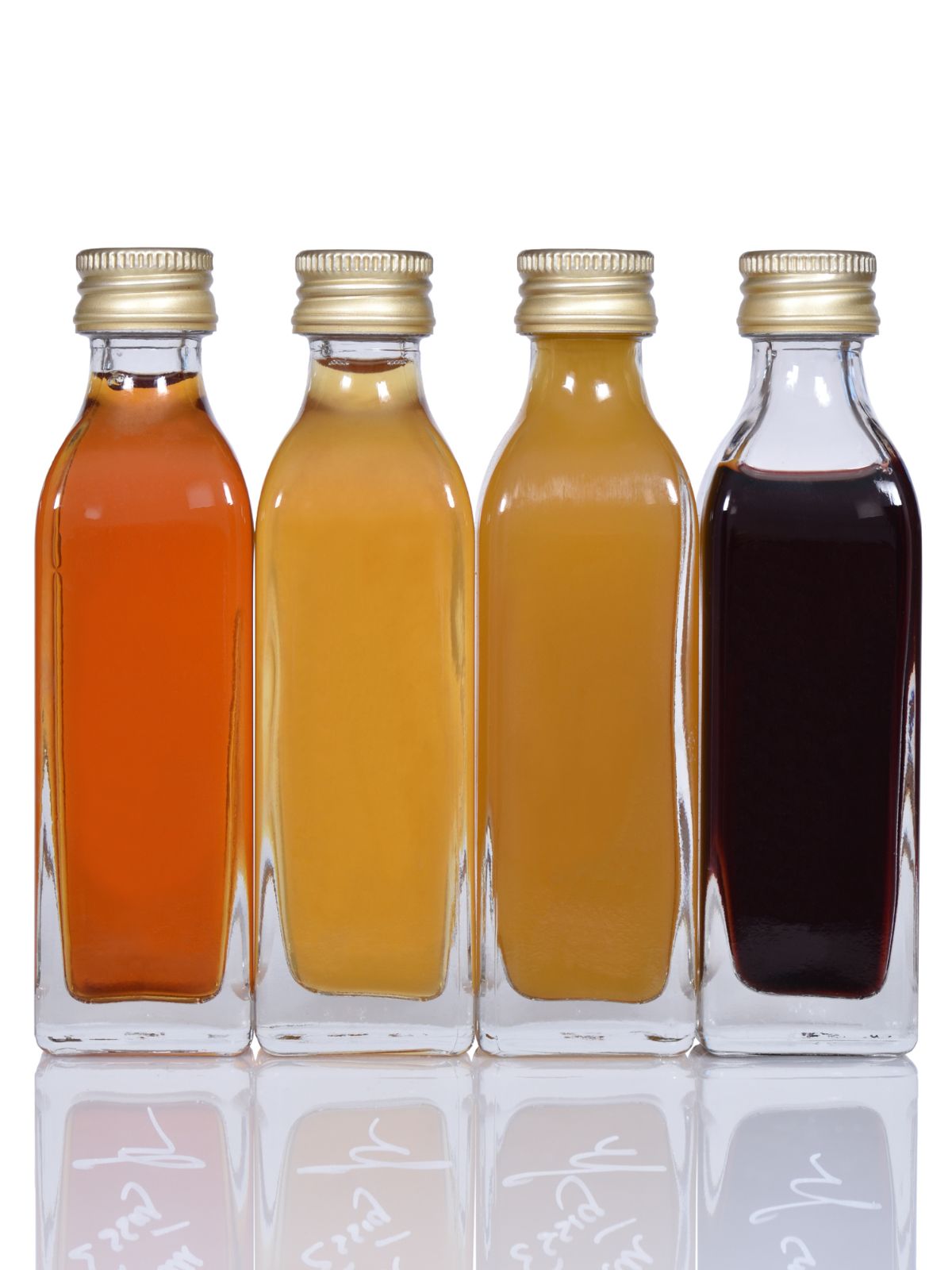 bottles of different types of vinegar.