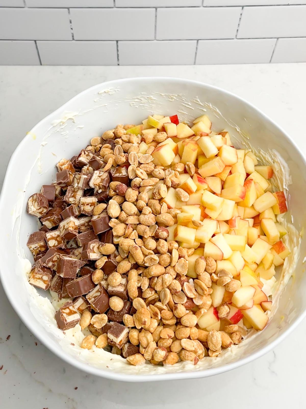 taffy apple salad ingredients in a white bowl